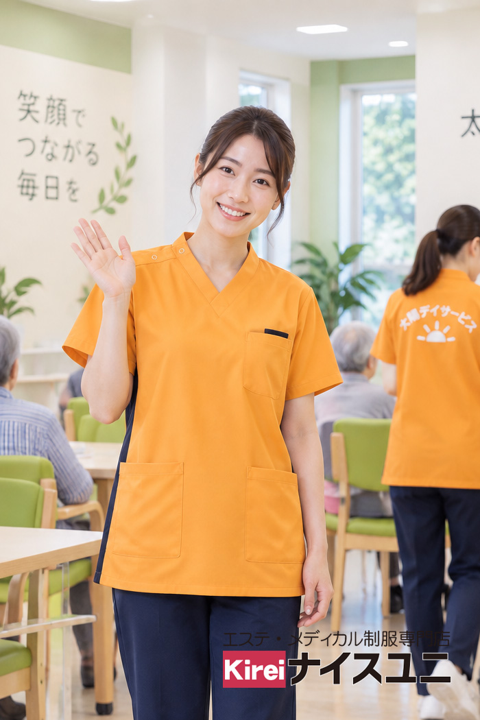 病院・エステ制服はコーデから選ぶ｜デイサービスの介護士制服｜オレンジ×ネイビーで明るい・親しみやすい介護ユニフォームコーデ【mxe0008】